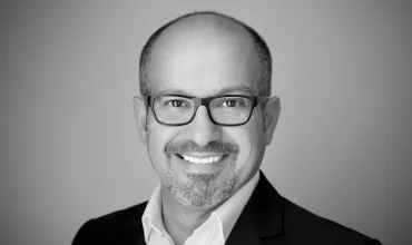 Male scientist working with lab equipment